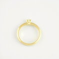 Klasicky zásnubný prsteň zo žltého zlata s jedným briliantom