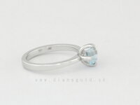 Zásnubný prsteň s bledo modrým kamienkom z bieleho zlata